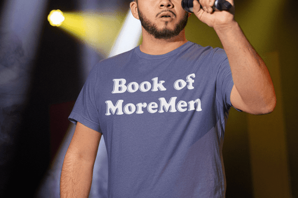 Introducing Our New “Book of MoreMen” Unisex Shirt: Faith, Humor, Pride, and a Whole Lot of Personality - JonesTees